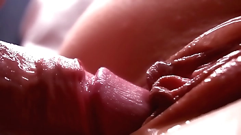 SLOW MOTION. Extremely close-up. Sperm dripping down the pussy