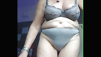 Granny fucks hairy pussy with cucumber